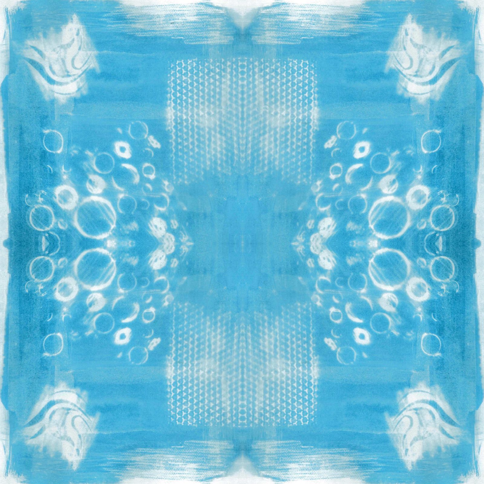 A square blanket decorated with an inky blue design