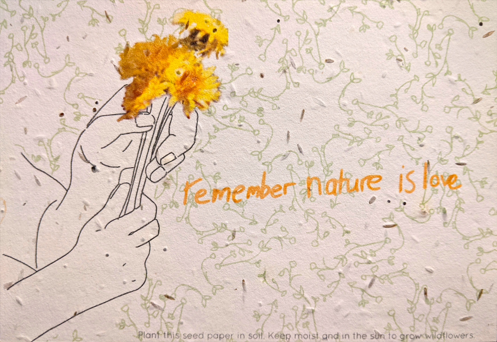 A black line drawing of hands holding yellow flowers. 'remember nature is love' in yellow text on a green patterned background.