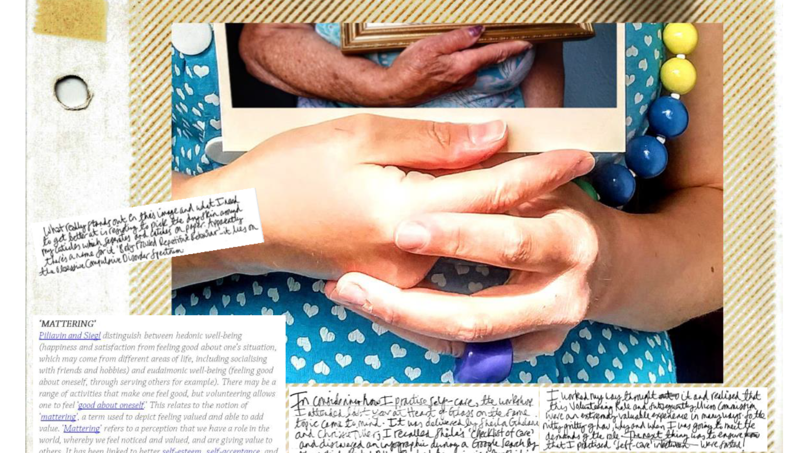 Two hands are clasped around a photograph of someone holding a gilt frame. The hands belong to someone in a bright blue dress wearing colourful beaded necklace. Around the images are handwritten messages.