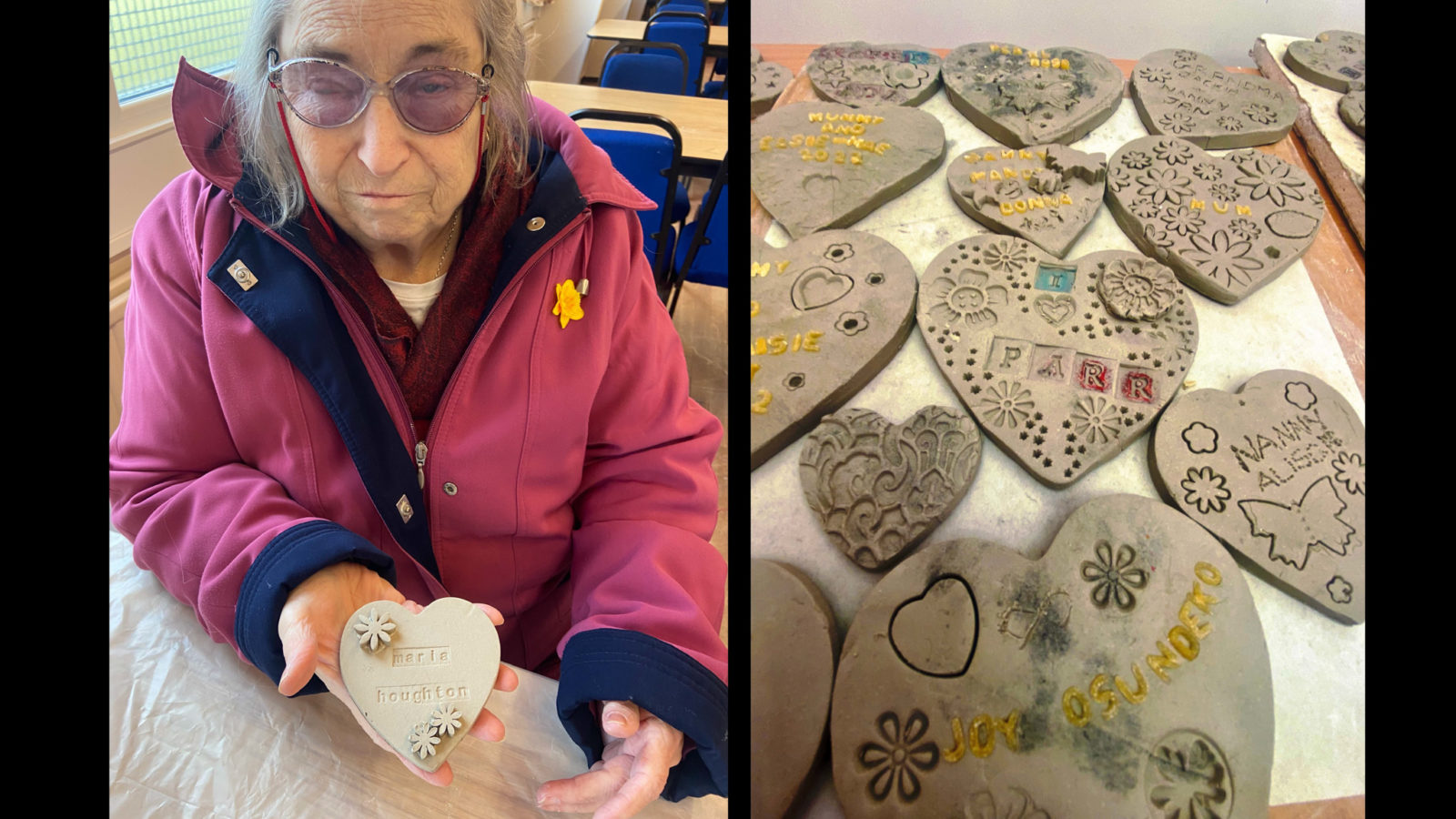 On the left, an elderly lady shows her clay heart to the camera, on the right is a table with unfired clay hearts on it.