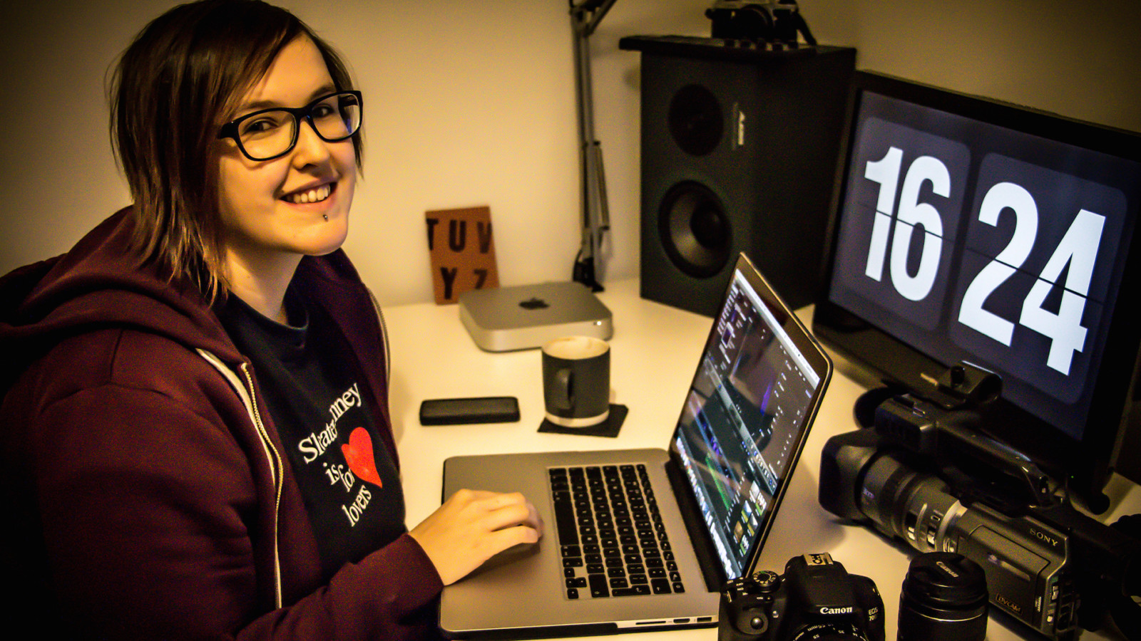 Lisa sitting at her desk in front of her computer