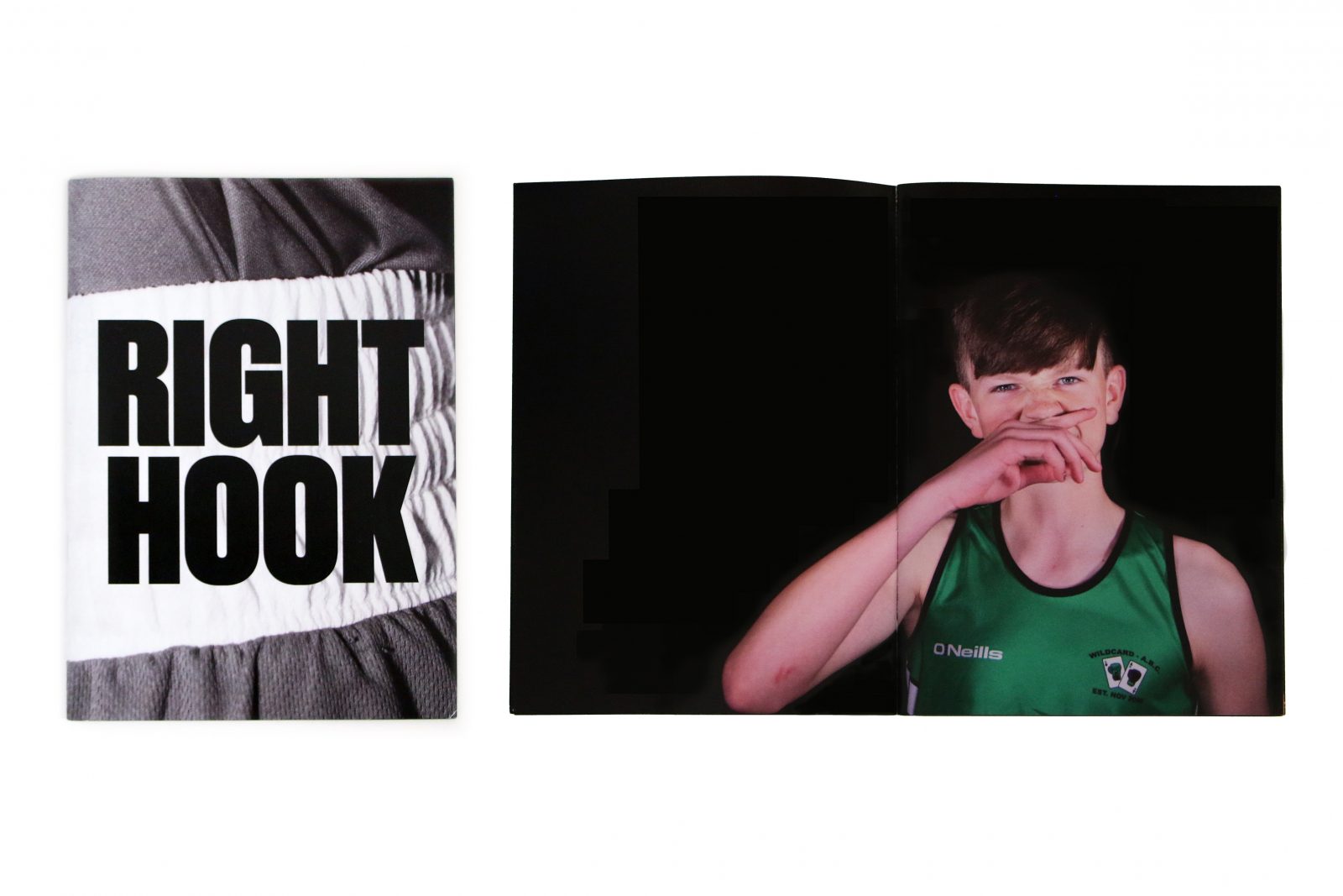 A black and white image reading 'RIGHT HOOK' in black text. An image of a young person wearing a green sports vest and wiping their mouth with their hand.