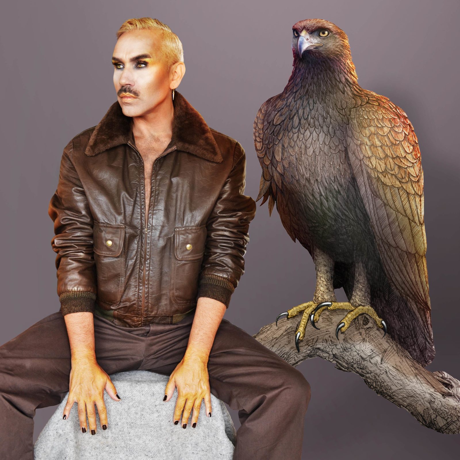 Paul Harfleet is dressed up as a Golden Eagle, with blonde hair, dark smokey eye shadow and gold highlights on his lips, brow bone and hands. He is wearing a brown leather jacket, brown trousers and behind him is an illustration of a golden eagle.