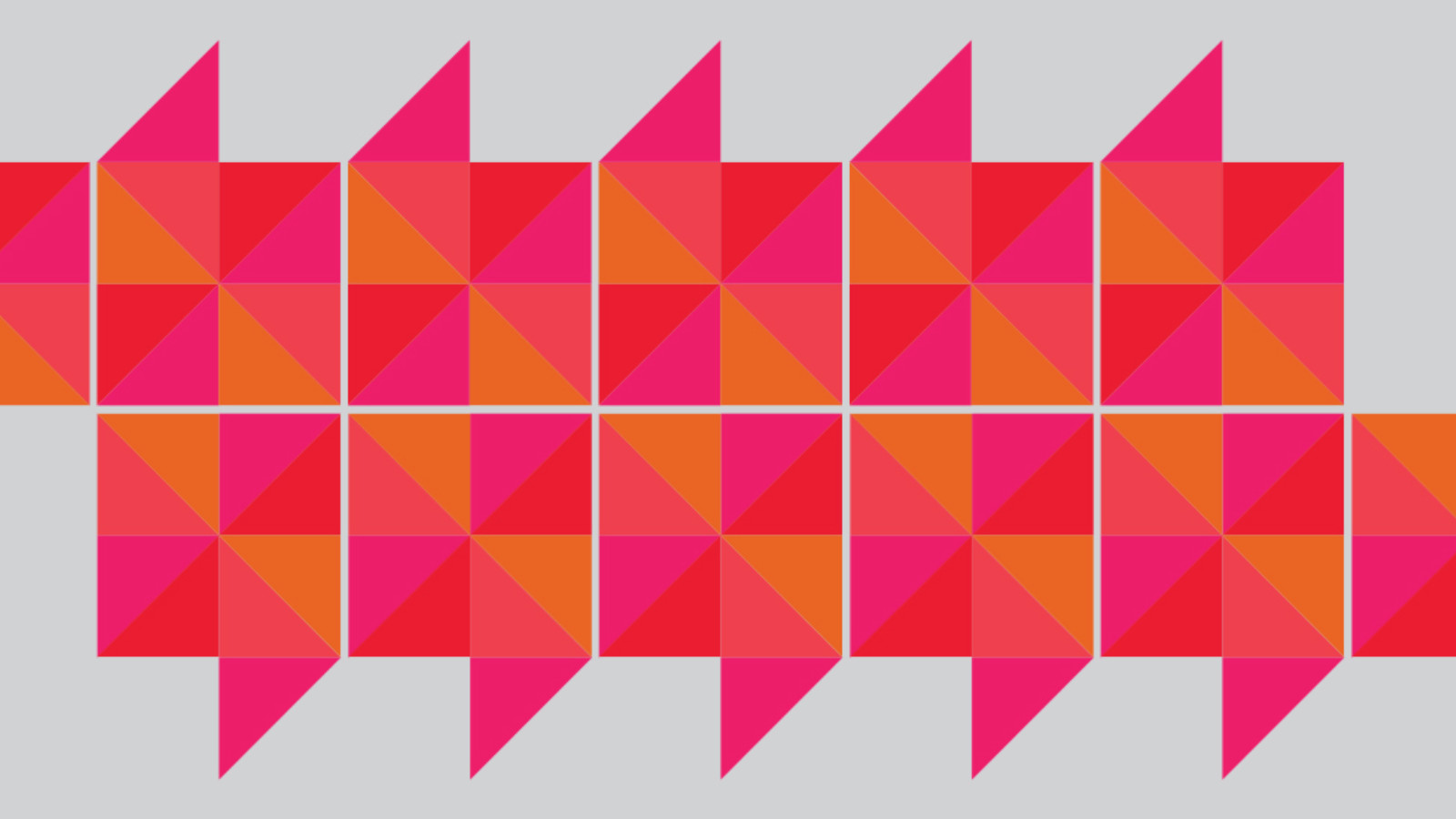 A colourful geometric graphic with red, pink and orange colours.